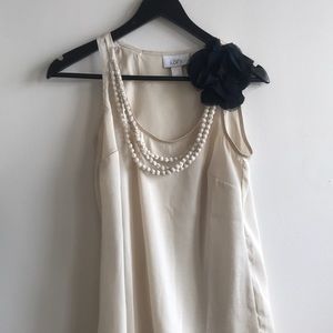 Ann Taylor cream colored Loft sleeveless top
